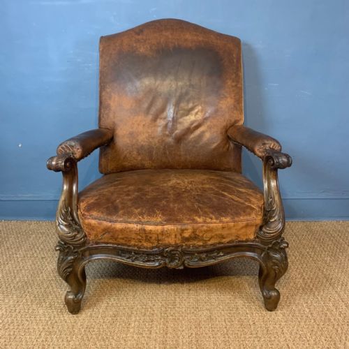 An Enormous Victorian Mahogany and Leather Library Armchair Circa 1870