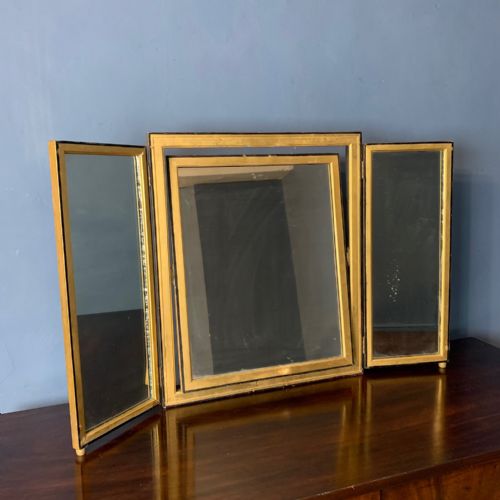 An Art Deco Gilt and Ebonised Triptych Dressing Table Mirror Circa 1930.