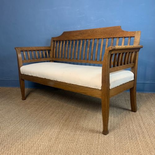 An Arts and Crafts Oak Sofa Circa 1910