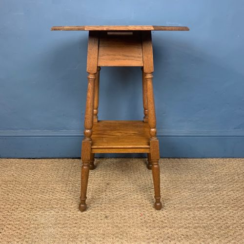 An Arts and Crafts Oak Octagonal Two Tier Lamp Table Circa 1910