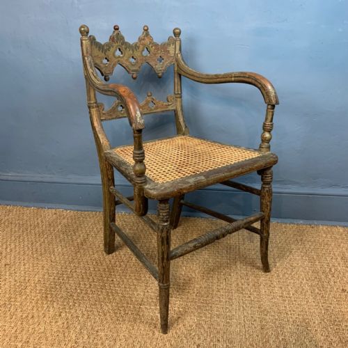 A Regency Gothic Painted Armchair Circa 1830 with the Original Decoration.
