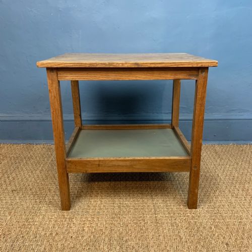 A Cotswold School Oak 2 Tier Table Circa 1930 .