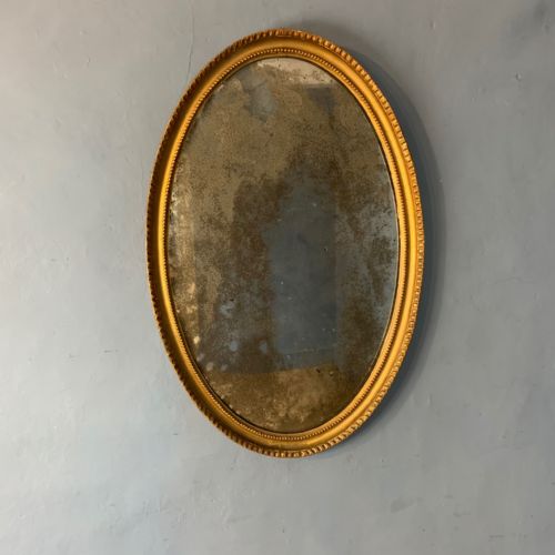 A George 111 Gilt Oval Mirror Circa 1790