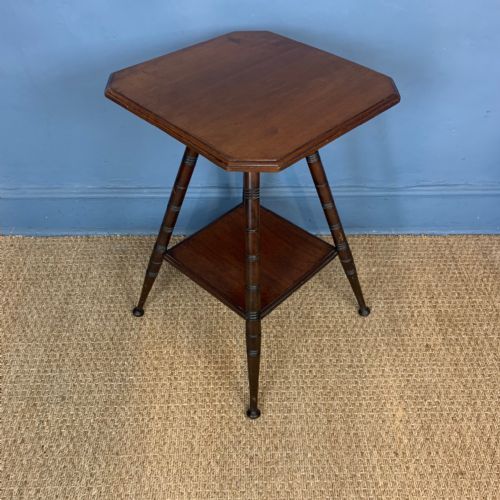 An Aesthetic Movement Walnut Two Tier Octagonal Table Circa 1890.