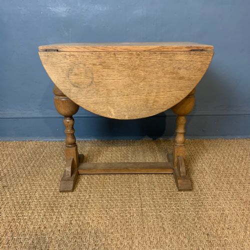 A Cotswold School Arts and Crafts Oak Drop Flap Oval Occasional Table Circa 1930
