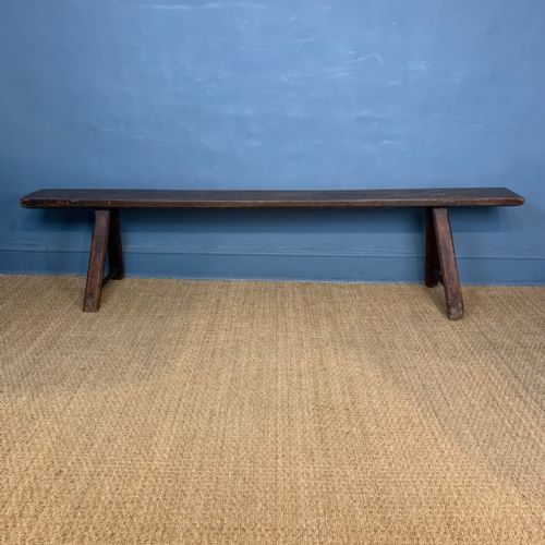 A 19th Century West-country Elm Long Bench.