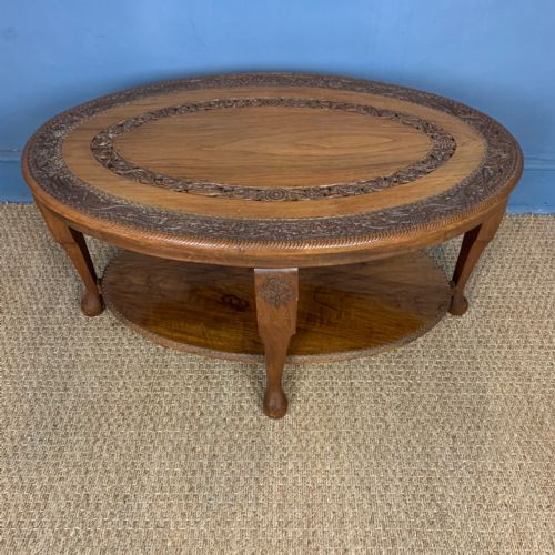 A Southern Indian Two-tier Carved Oval Coffee Table Circa 1920