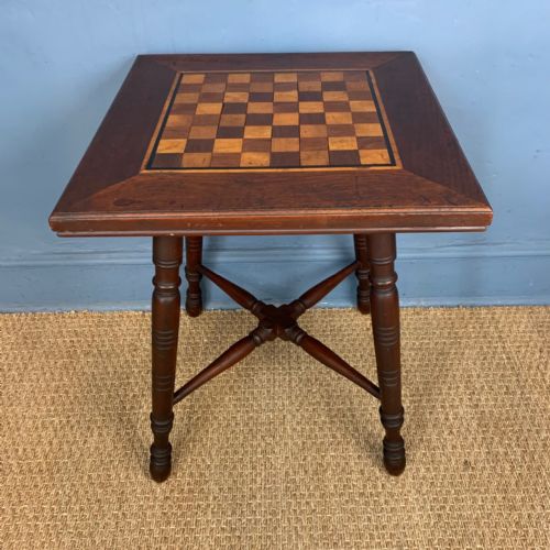 A Bombay Furniture Company Teak and Satinwood Inlaid Chess Table Circa 1910 .