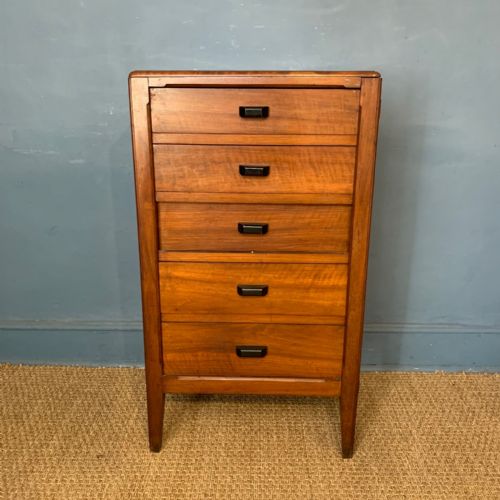 An Art Deco Narrow Teak 5 Drawer Wellington Chest Circa 1930 Attributed to the Token Workshops of Betty Joel Portsmouth.