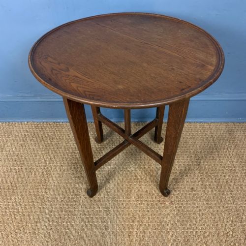 An Arts and Crafts Oak Dish Topped Table Circa 1900