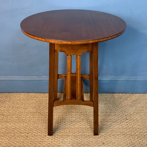 An Ambrose Heal Designed Mahogany and Satinwood Cross-banded Circular Lamp Table Circa 1910