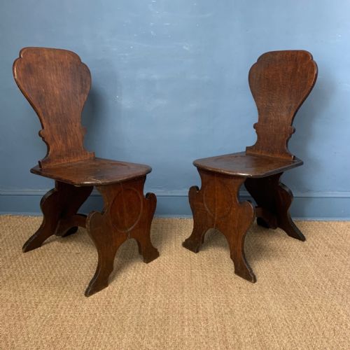 A Pair of Early George III Provincial Oak Sgabello Hall Chairs Circa 1770