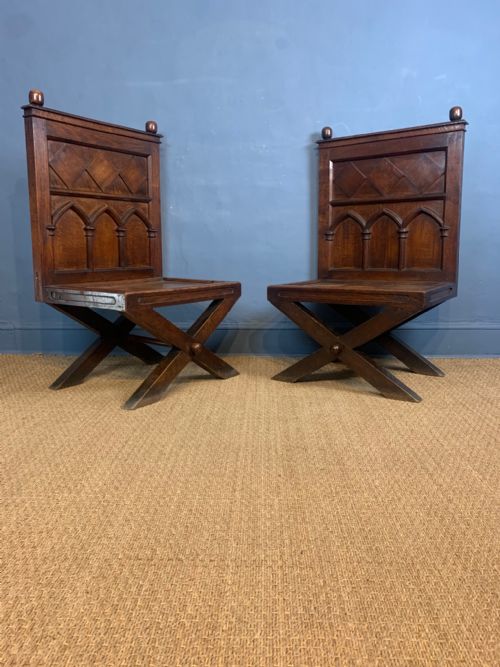 A Pair of English Oak Gothic Revival Hall Chairs Circa 1860