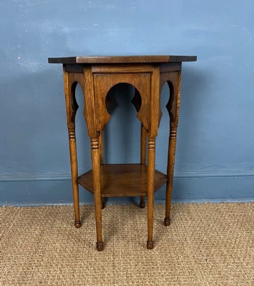 A Liberty and Co Oak Moorish Hexagonal 2 Tier Table Circa 1900