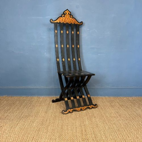 An Unusual Arts and Crafts Ebonised and Inlaid Savonarola Type Slatted Chair Circa 1910