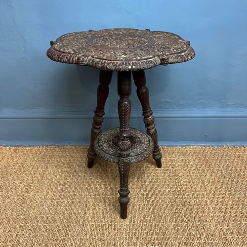 An Indian Carved Teak Table. Bombay Circa 1900