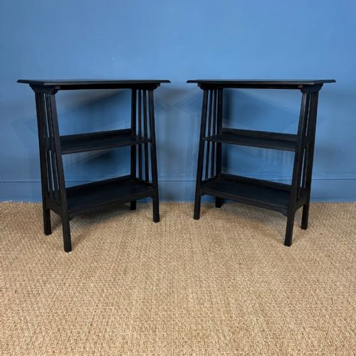 A Pair of Liberty and Co Ebonised Oak Three Tier Side Stands Circa 1900