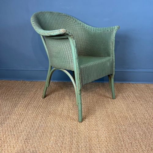 A Lloyd Loom Armchair Circa 1930 in the Original Green Paint