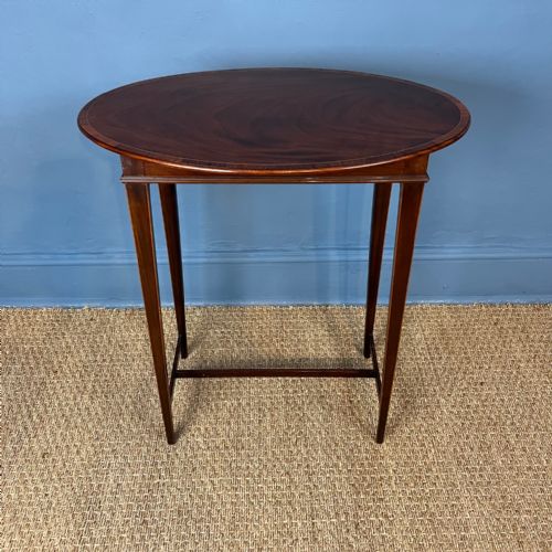 An Unusual Edwardian Oval Mahogany and Crossbanded Occasional Table Circa 1910.