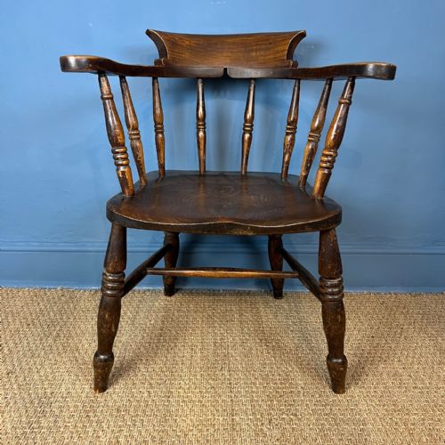 A Late 19th Century Smokers Bow Armchair Circa 1890