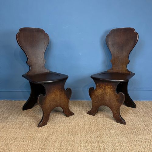 A Pair of Early George III Mahogany Sgabello Hall Chairs Circa 1760