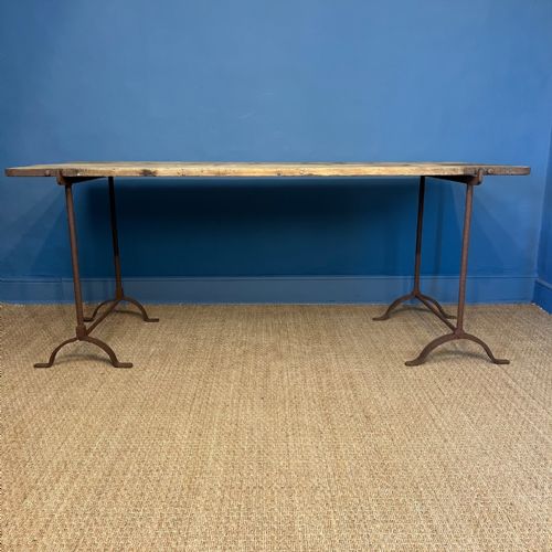 A Victorian Pine and Iron Trestle Table Circa 1881