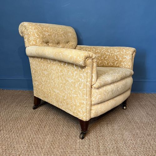 An Edwardian Armchair Circa 1910 by Waring and Gillows