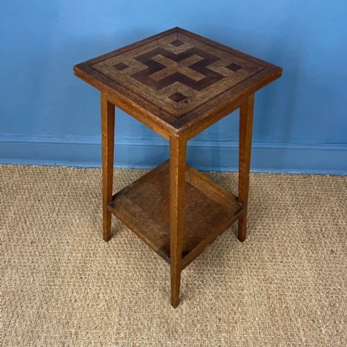 An Arts and Crafts Oak and Parquetry Table Circa 1910