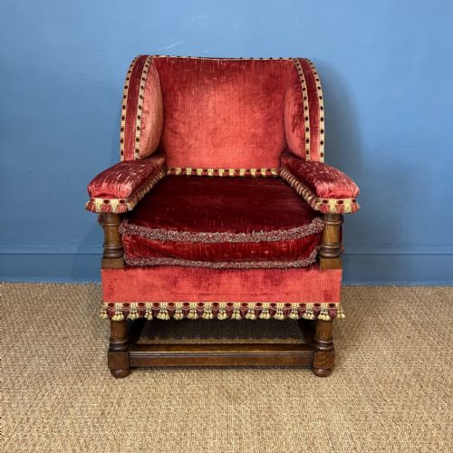 An Edwardian Red Velvet Oak Armchair Circa 1910 in Early 17th C Style .