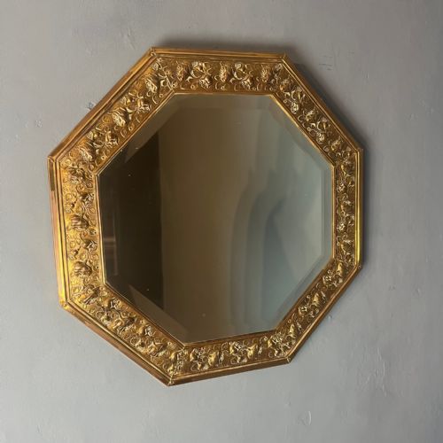 An Arts and Crafts Brass Embossed Octagonal Mirror Circa 1890