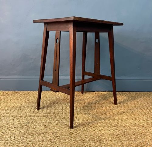 An Arts and Crafts Walnut 2 Tier Table Circa 1900