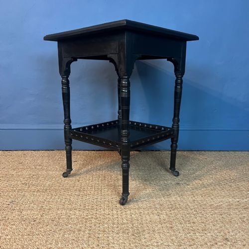 An Aesthetic Movement Ebonised 2 Tier Table C 1880  After a Design by E W Godwin .