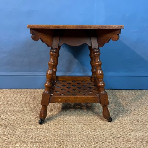 An Arts and Crafts Oak 2 Tier Square Table Circa 1880