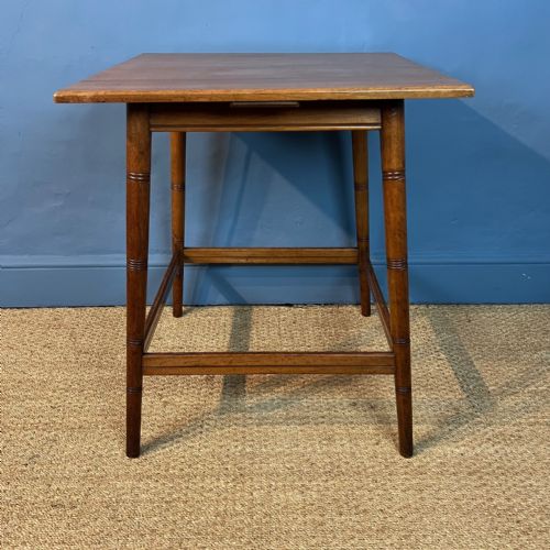 A Large Aesthetic Movement Walnut Square Table Circa 1880