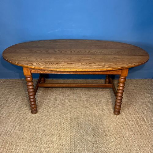 An Arts and Crafts Elliptical Oak Table Circa 1900