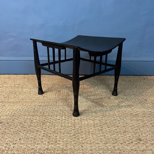 A Liberty and Co Mahogany Ebonised Thebes Stool Circa 1900
