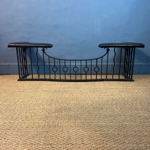 An Arts and Crafts Wrought Iron Club Fender Circa 1910