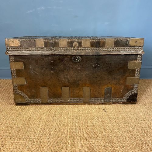 A LATE GEORGIAN CHINESE EXPORT LEATHER AND BRASS BANDED TRAVELLING TRUNK CANTON CIRCA 1820