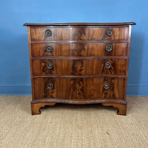 A GEORGE 111 MAHOGANY SERPENTINE CHEST OF DRAWERS CIRCA 1790 - ADDITIONAL PHOTO 1