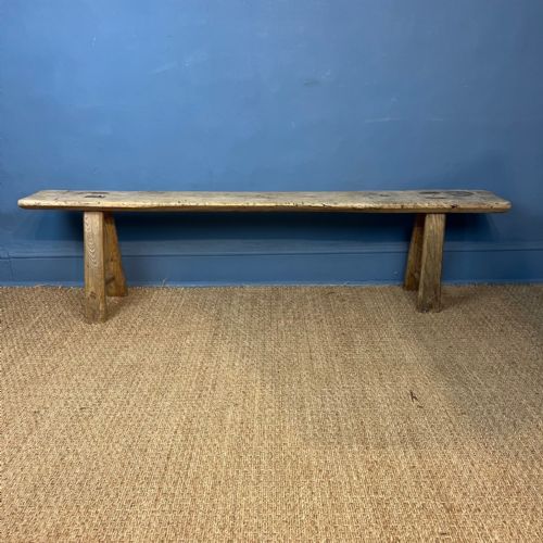 A LATE 19TH WEST COUNTRY ELM PIG BENCH - ADDITIONAL PHOTO 1