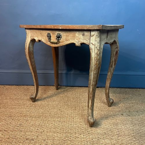 An Arts and Crafts Limed Oak Serpentine Side Table Circa 1920