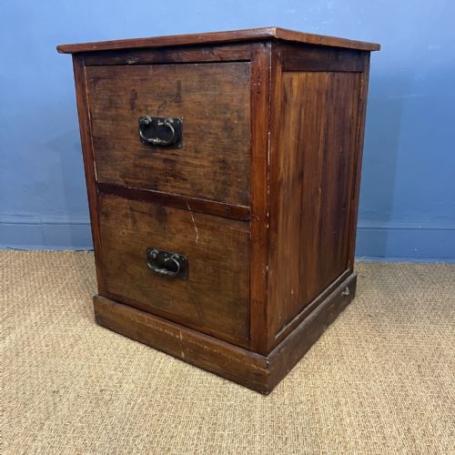 AN ANGLO INDIAN TEAK TWO DRAWER FILING CABINET CIRCA 1910