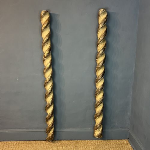 A PAIR OF 18TH C GILT AND WHITE PAINTED ITALIAN SOLOMONIC COLUMNS CIRCA 1780