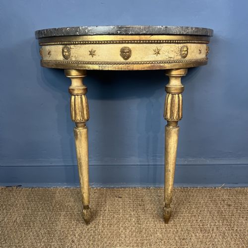 AN EARLY 19TH GENOESE CREAM PAINTED AND PARCEL GILT CONSOLE TABLE CIRCA 1810