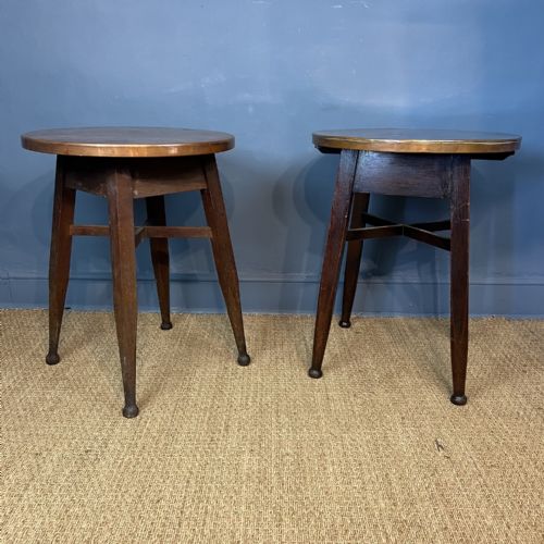A MATCHED PAIR OF LATE 19TH CENTURY COPPER TOP OAK TABLES ATTRIBUTED TO LIBERTY AND CO CIRCA 1900