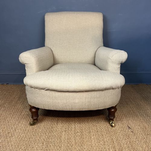 A LATE VICTORIAN MAHOGANY LIBRARY ARMCHAIR CIRCA 1890