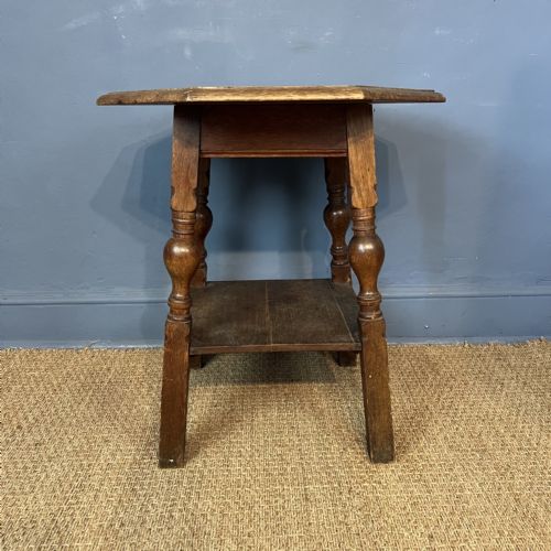 AN ARTS AND CRAFTS OAK TABLE CIRCA 1900 ATTRIBUTED TO LIBERTY AND CO