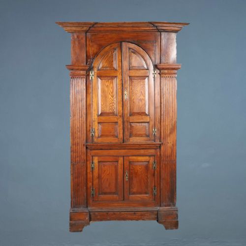 A GEORGE 111 ELM ARCHITECTURAL STANDING CORNER CUPBOARD CIRCA 1770