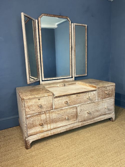 A HEALS LIMED OAK DRESSING TABLE CIRCA 1930
