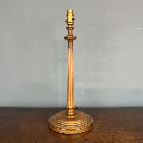 AN EDWARDIAN FLUTED WALNUT TABLE LAMP CIRCA 1910